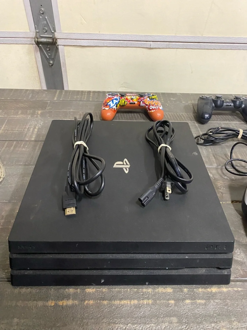 Sony PlayStation 4 Pro Black Console with 4 Controllers and charging dock
